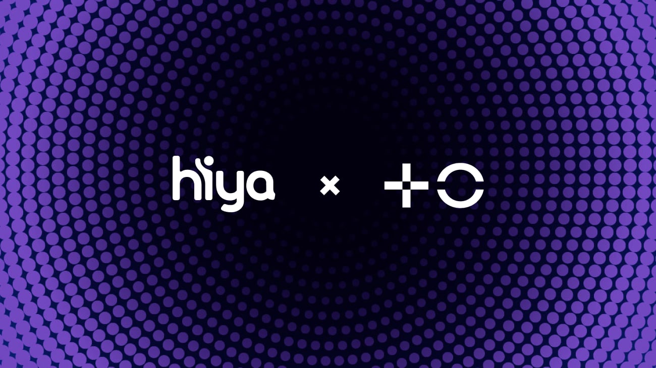 Dark purple and black background with white logos of Hiya and MasOrange in partnership in the foreground